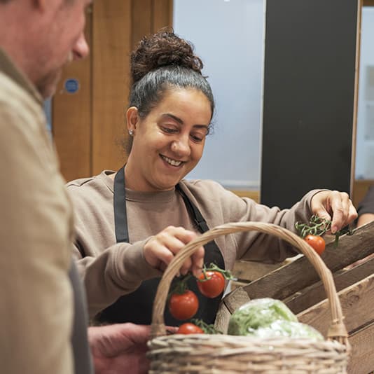 Lady volunteering at foodbank